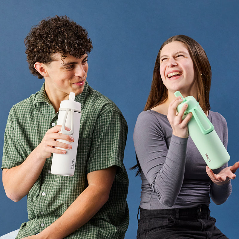 Insulated flip top drinking bottle